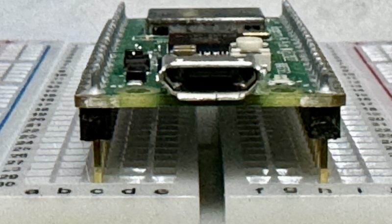 Gently and evenly insert the Raspberry Pi Pico W into the Breadboard at 30C to H11